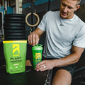 ascent protein athlete mixing vegan protein powder in a protein blender shaker