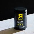 Ascent Clean Creatine 100 serving Container on a white surface with a black background
