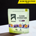 A stand-up pouch of Ascent Clean Hydration electrolyte drink mix in passion fruit flavor, shown on a white surface against a black background. A yellow banner at the top reads '20 ON-THE-GO-STICKS PER BAG'.