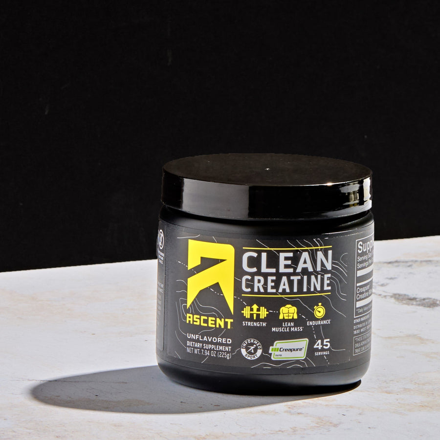 unflavored clean creatine powder jar on a table