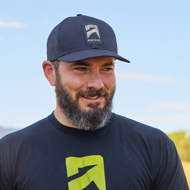 baseball hat with ascent protein powder logo in camo