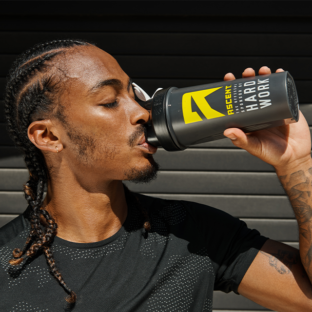 protein shaker bottle by ascent protein with yellow logo