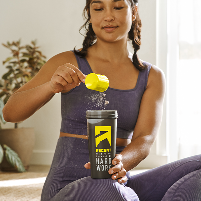 athlete preparing a protein powder shake split_row_banner_1